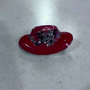 Red Hat society pin with red hat and purple gems like new gold accents